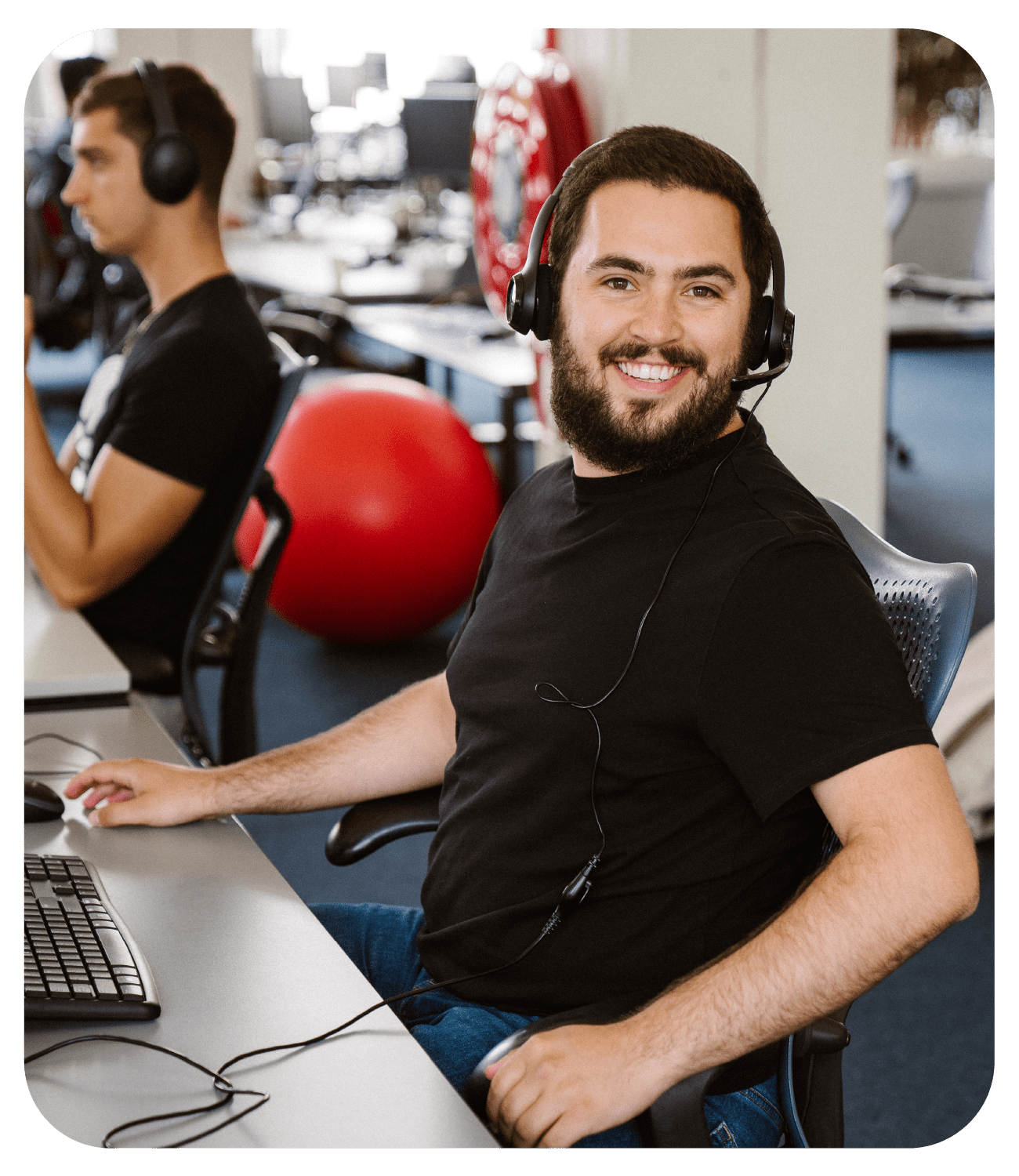 sana customer support team man wearing headset smiling