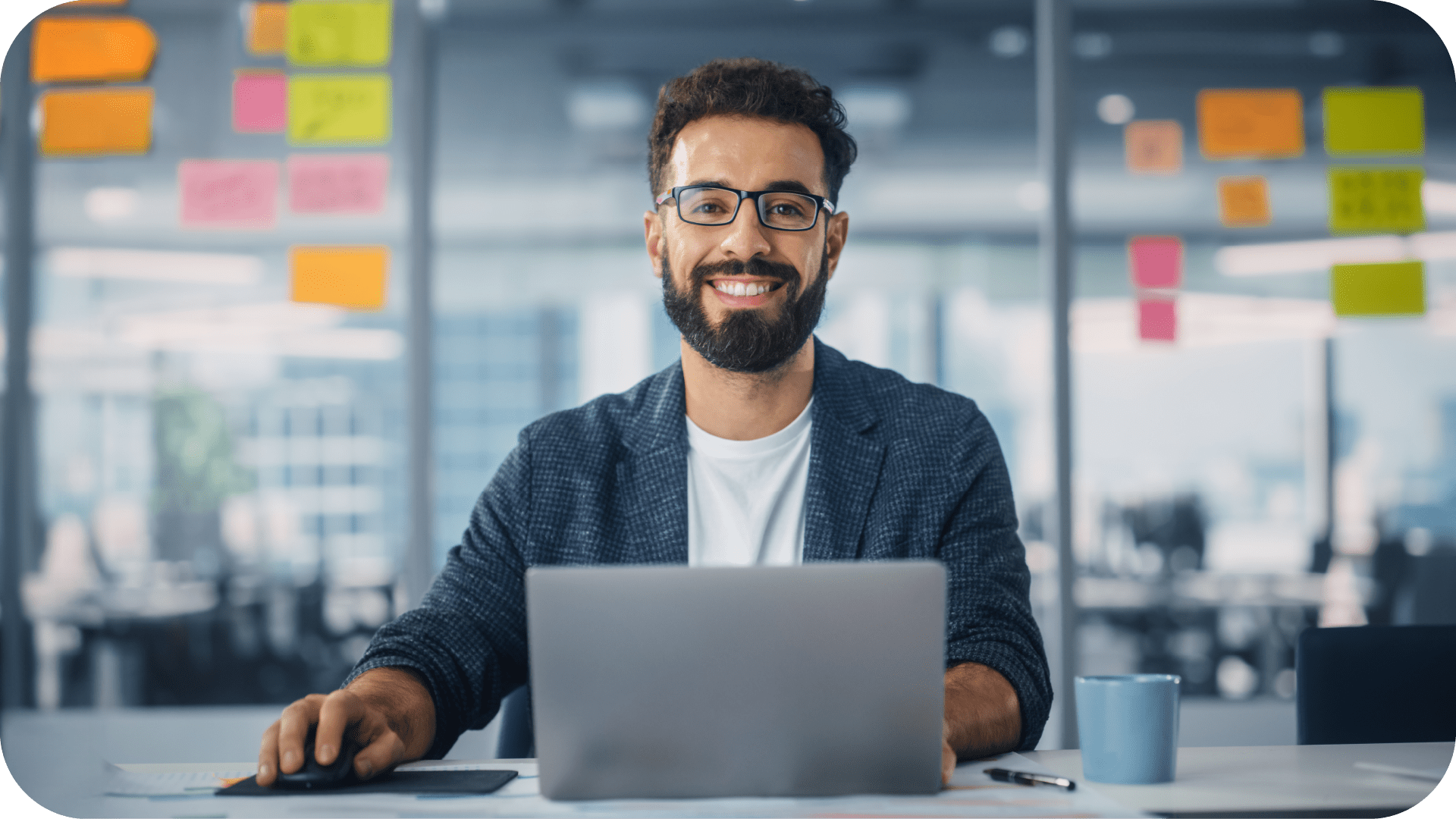 man sitting at desk working on a laptop what buyers want